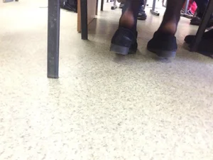 College Girl’s Feet in Black Pantyhose With Shoes Half Taken Off Under Table Candid Photos