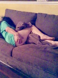 Barefoot Skinny Girl in T-Shirt Covering Her Booty With Hand While Lying on the Couch Home Creepshot