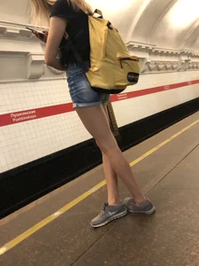 Cute Skinny Teen in Jean Mini Shorts Standing on the Subway Platform