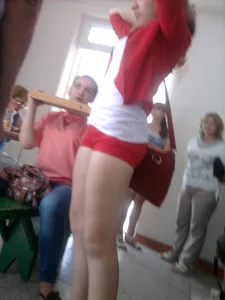 Girl in Mini Shorts and Sandals Candid