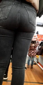 Teen in tight jeans shopping