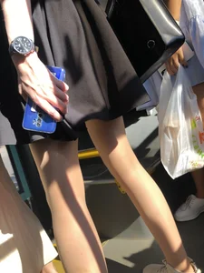 Public bus candid girl in a dress and slim legs in pantyhose