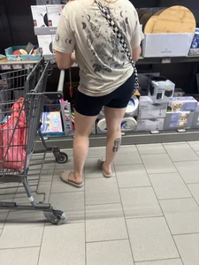 Milf in black biker shorts and flip flops