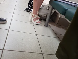 Feet in High-Heeled Sandals Closeup Creepshot