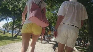 Milf in yellow shorts with vpl and a wedgie