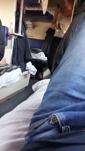 Candid girls with smoking asses in leggings passing by in a train sleeping car