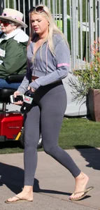 Thick blonde out in grey leggings with a nice ass