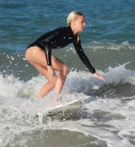 Hot surfer chicks out in the water