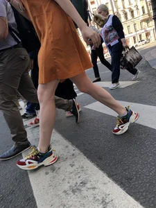 Cute Teen Girl in a Dress With Slim Legs Standing in the Subway Train, Then Crossing the Street Photo Gallery