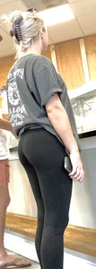 Perky blonde hottie in tight black leggings getting some ice cream