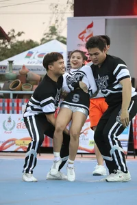 Bunch of athletic Thai cheerleaders at a competition