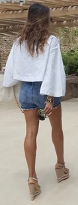 Flat ass leggy girl in denim shorts