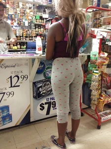 Black girl with a sexy ass in tight grey heart leggings