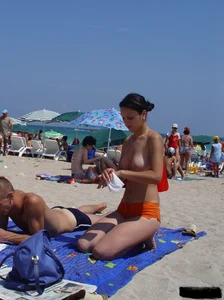 Beach voyeur girls in bikinis, thongs and topless