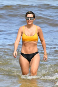 Frankie Bridge nip slips in a bikini on the beach