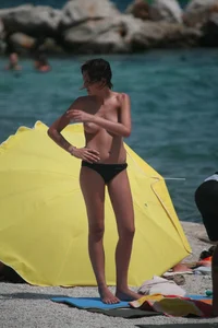 3 amazing topless girls on a nudist beach