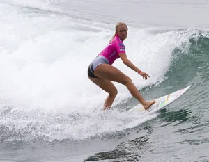 Candid surfer babes on the beach and in bikinis