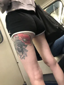 A Tall And Slim Candid Girl in Spandex Shorts in a Hoodie Top, With Tattoos on Her Long Legs Subway Creepshots