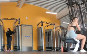 Gym brunette in tight grey shorts