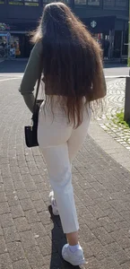 Sexy candid chick with long hair wearing white pants street creepshots