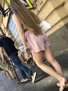 Cute candid girl in pink shorts street photos