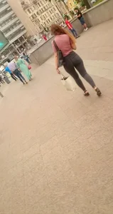 Awesome big but in tight grey jeans on the street - candid girl coming out of the subway station creepshot