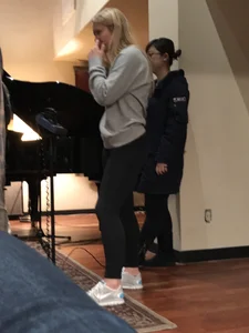 A hot blonde with beautiful smile and nice ass in leggings