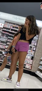 Cute teen in shorts at the store