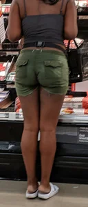 Ebony chick grocery shopping in green shorts