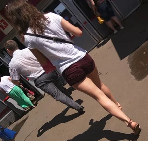 Girl in a T-Shirt and Shorts with Hot Legs Creepshot - Cute Sandals