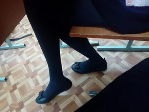 Teen JB with Thin Legs in Pantyhose Showing Feet in a Classroom Candid