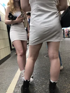 Group of Teens in Short Dresses in a Subway Train and on an Escalator Gallery