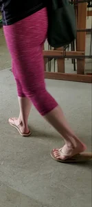 Milf shopping with a nice ass in tight maroon leggings