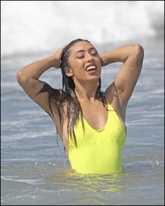 Sexy ass beach babe in a yellow thong swimsuit