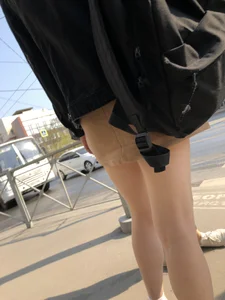 Hot Legs in a Skirt - Girl Standing on the Pedestrian Crosswalk Closeup Creepshots
