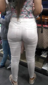 Latina with a nice ass in tight white jeans