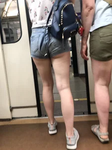 Cute And Slightly Awkward Tall Teen Girl in a Top and Denim Shorts Subway Train Candid Photos