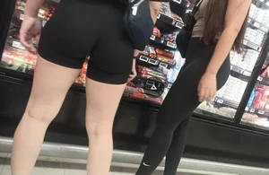 Two fitness girls  in black shorts and leggings in the supermarket [OC]