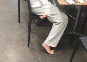 Bare Feet Closeups at a Desk Creepshots Gallery