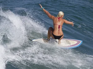 Candid surfer babes on the beach and in bikinis
