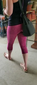 Milf shopping with a nice ass in tight maroon leggings