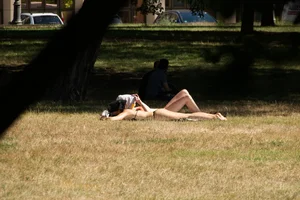 Creepshots of some girls in the park getting some sun in bikinis