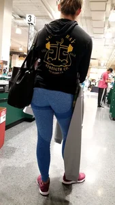 Milf with a nice ass in tight blue leggings at Dick's