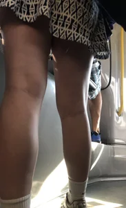 Young girl in a skirt bus and street creepshots
