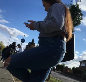 Long haired beauty teen with a tight ass in jeans