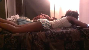Black sexy girlfriend laying around in little shorts