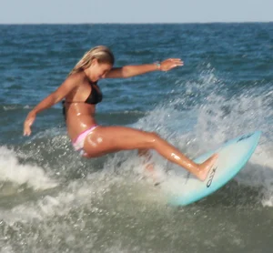 Hot surfer chicks out in the water