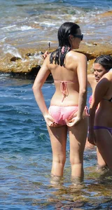 Wet Milf in Sunglasses and Swimsuit Touching Her Booty Beach Candid Photo