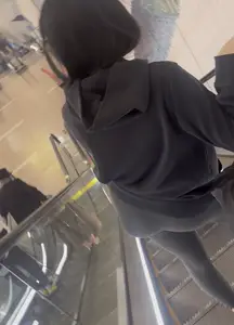 Tight curvy latina at airport pulls up pants