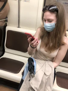 Cute Girl With Long Wavy Hair in a Mask Subway Train Photos - Candid Downblouse